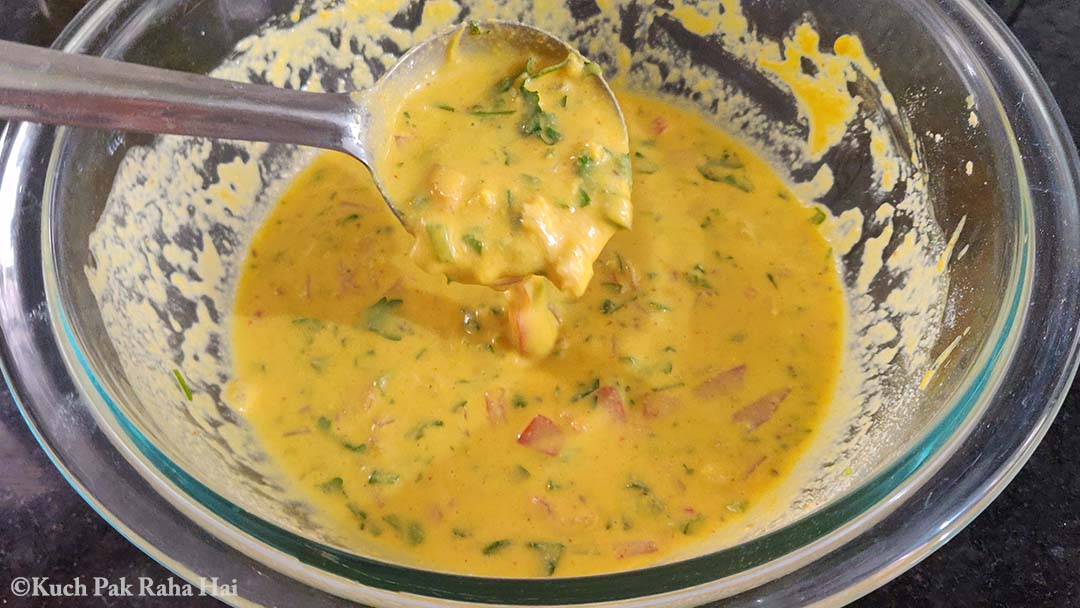 Preparing savoury pancake batter.