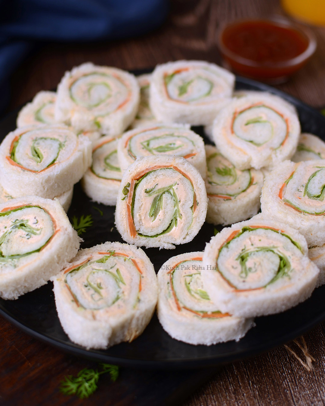 Veg pinwheel sandwiches with cream cheese.