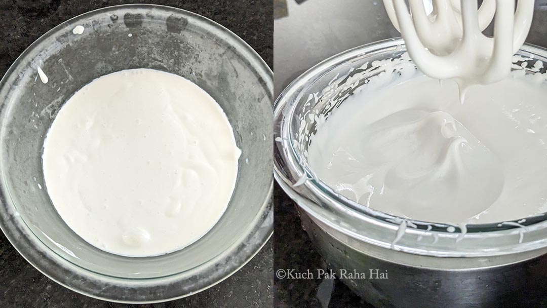 Whisking whipping cream with electric beater.