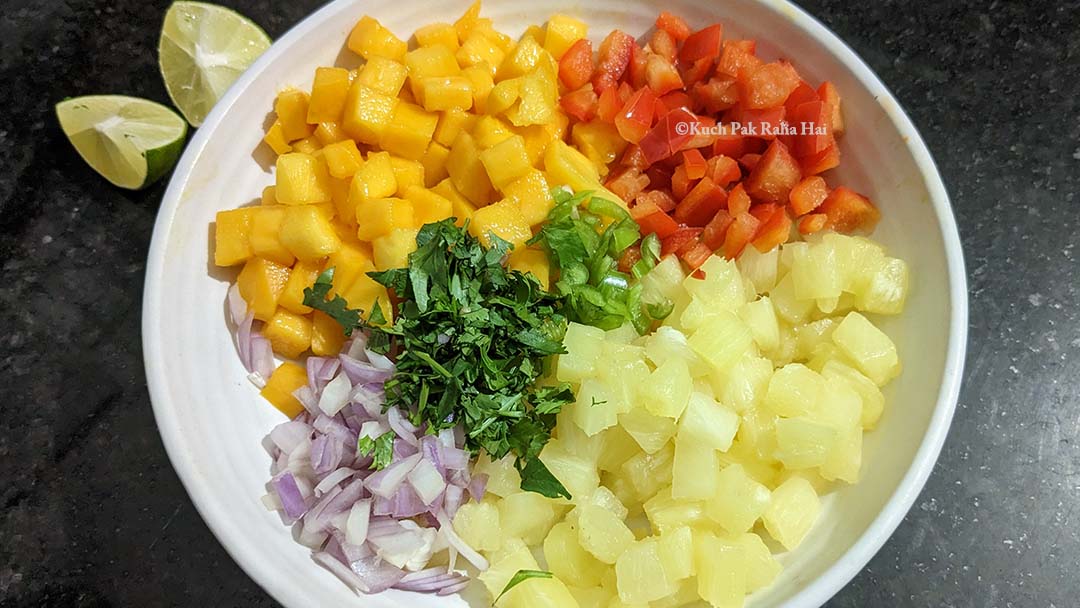 Diced mangoes & pineapples in a bowl