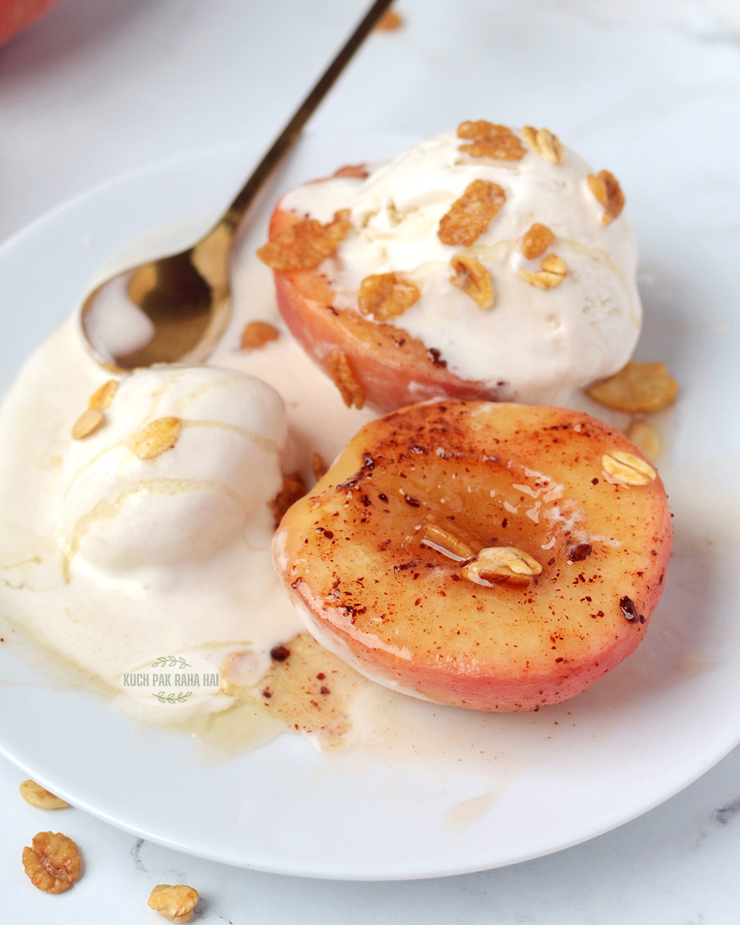 Air fryer peaches served with ice cream honey oats.