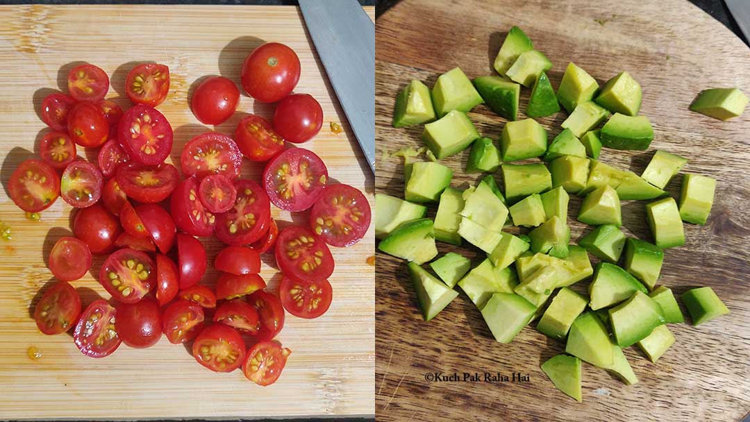 Chopping tomatoes and avocados for salad.