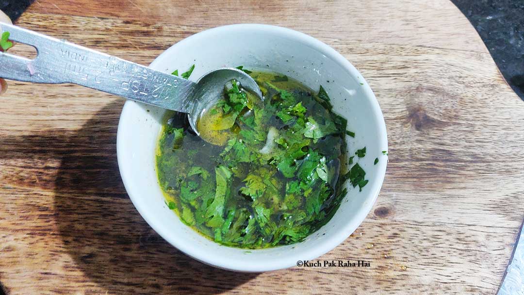 Preparing lime vinaigrette salad dressing.