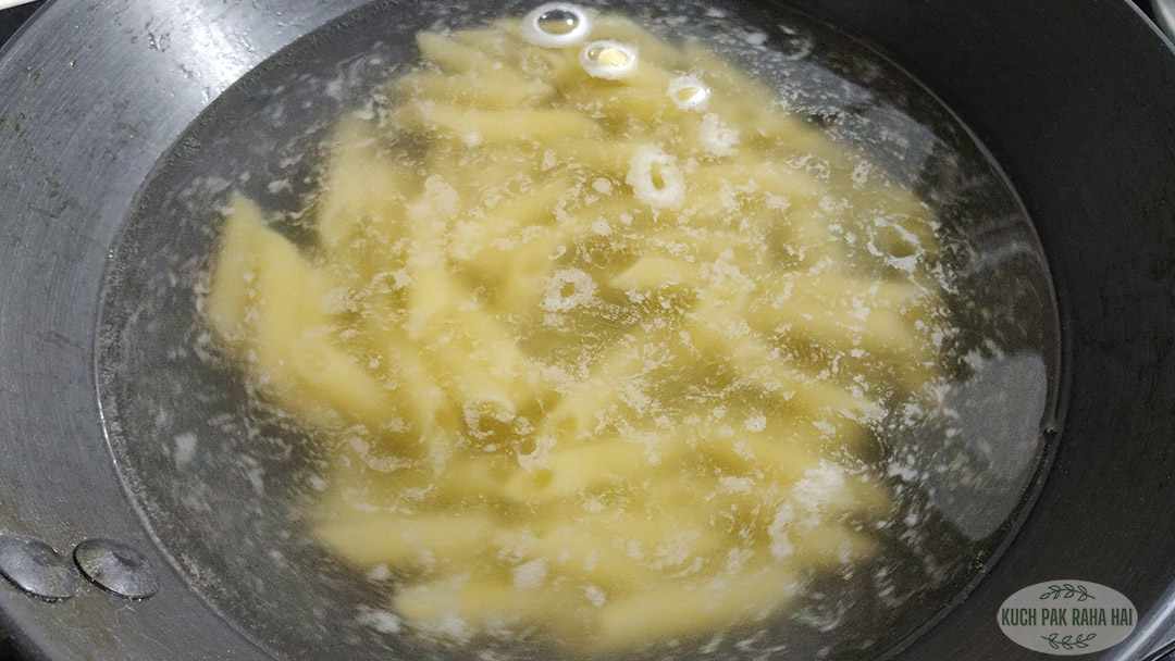 Boiling pasta in a pot.