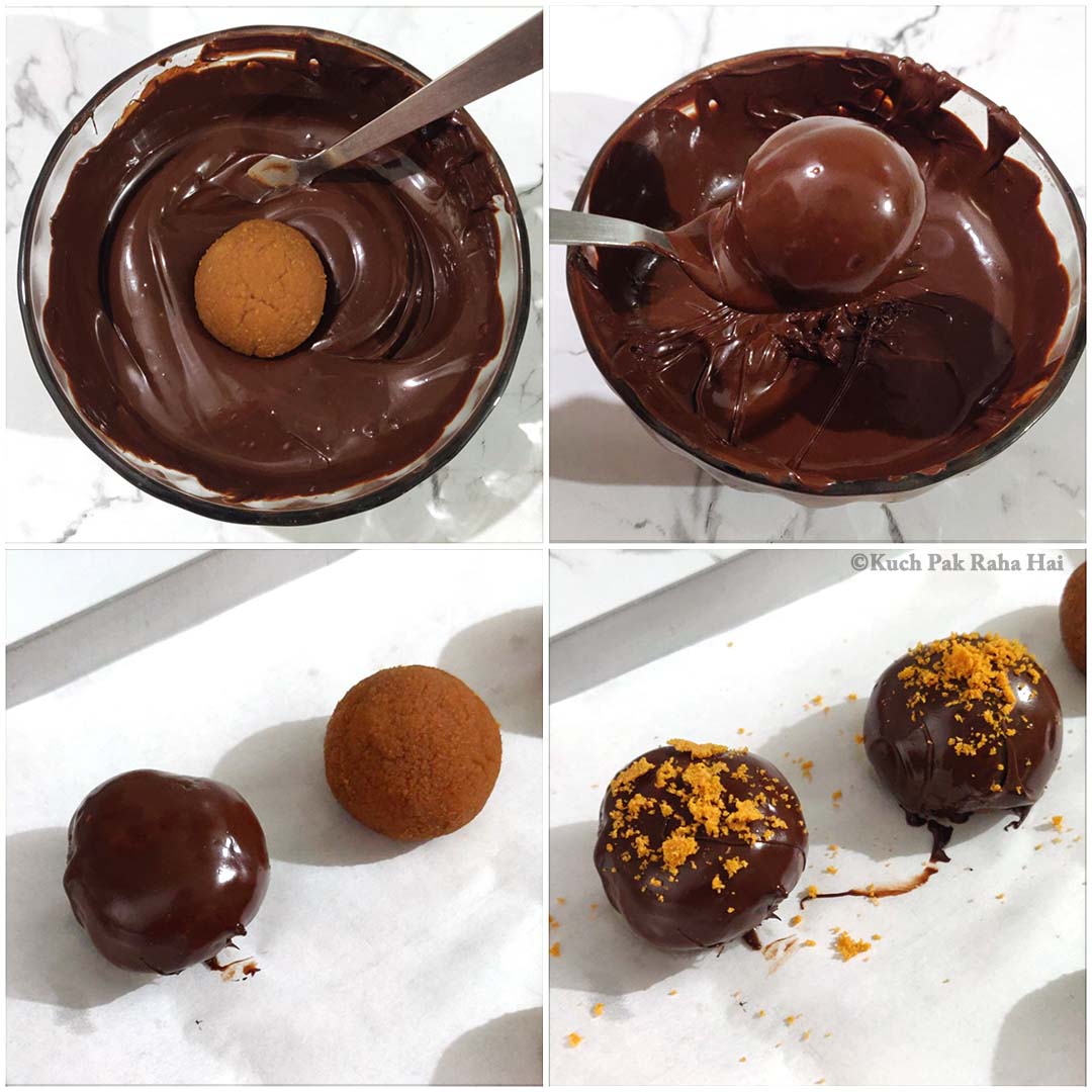 Dipping truffles in dark chocolate.