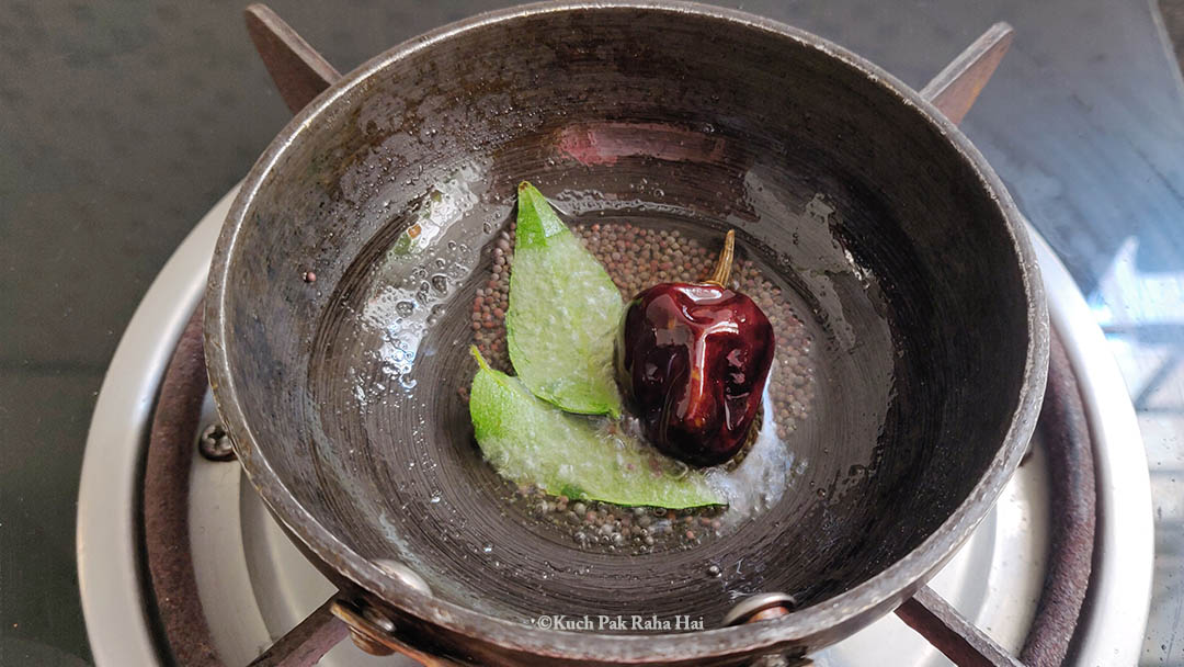 Preparing tempering for chutney.