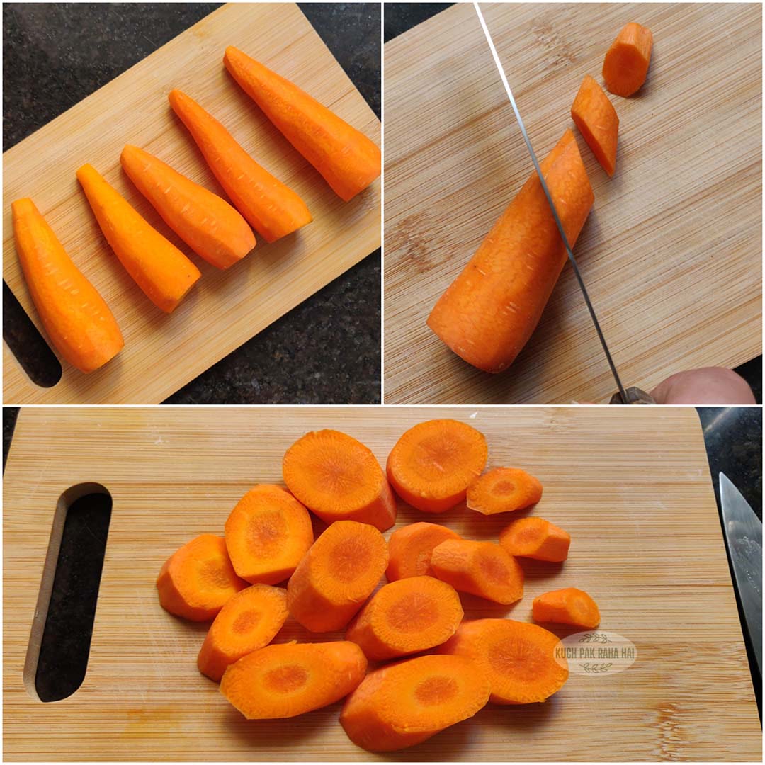 Chopping carrots on wooden board.