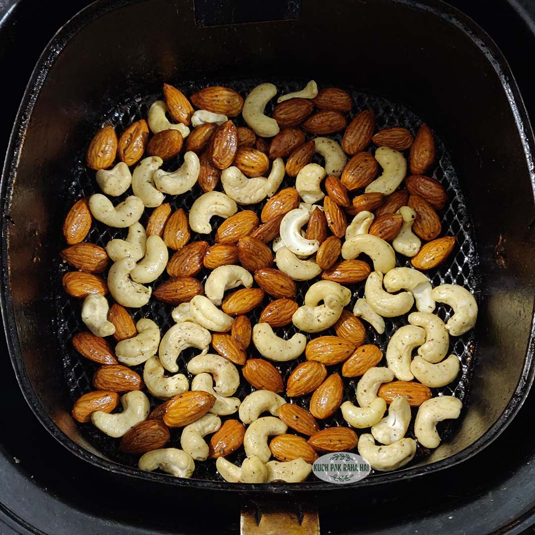 Almonds cashews in air fryer baskt