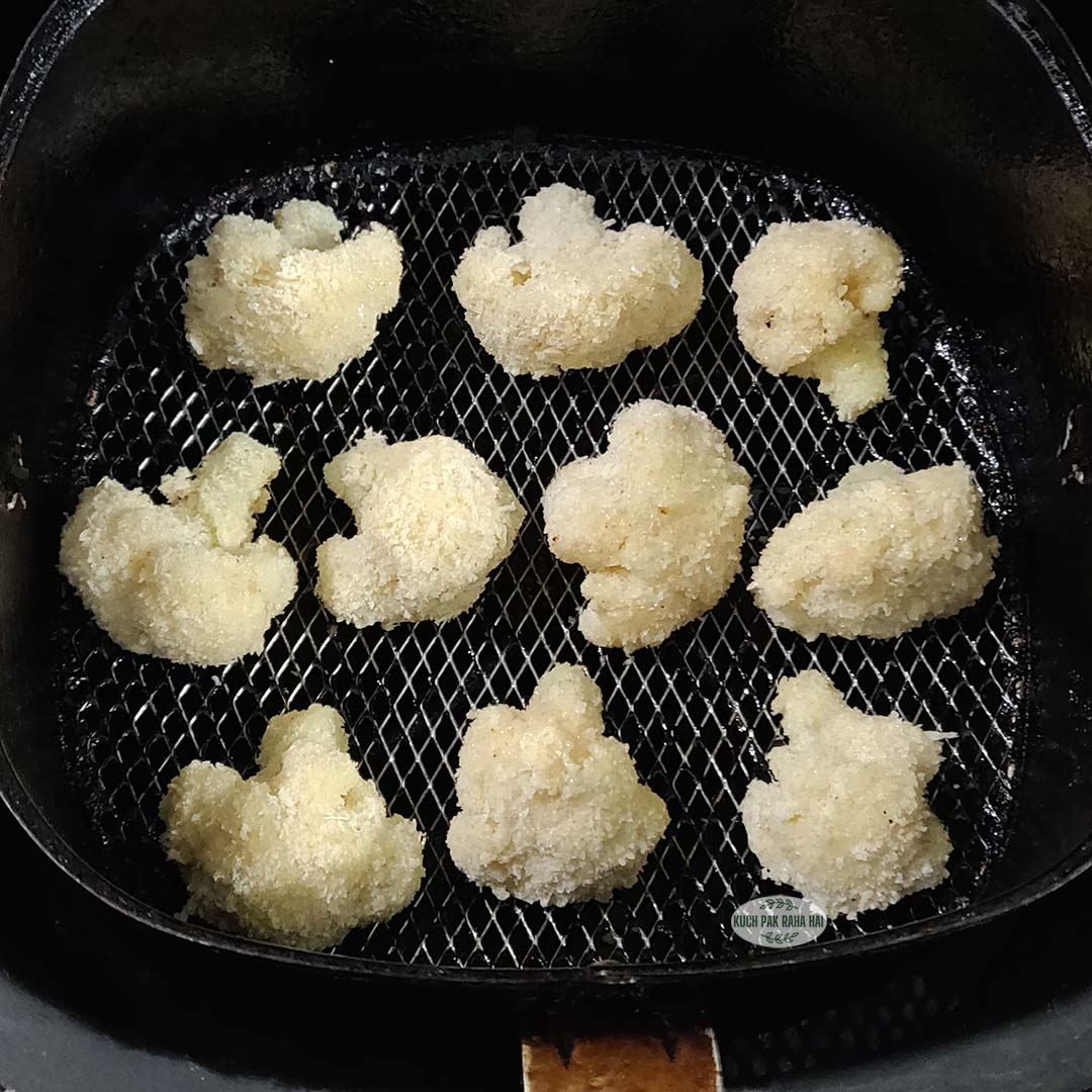 Making breaded cauliflower in air fryer.