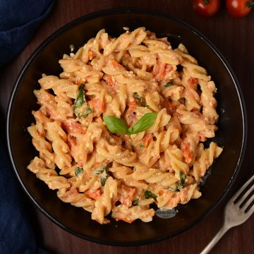 Air fryer pasta recipe with feta and cherry tomatoes.