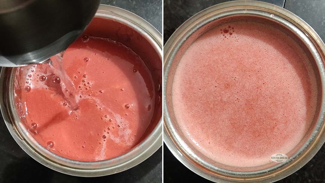Blending strawberries with coconut water.