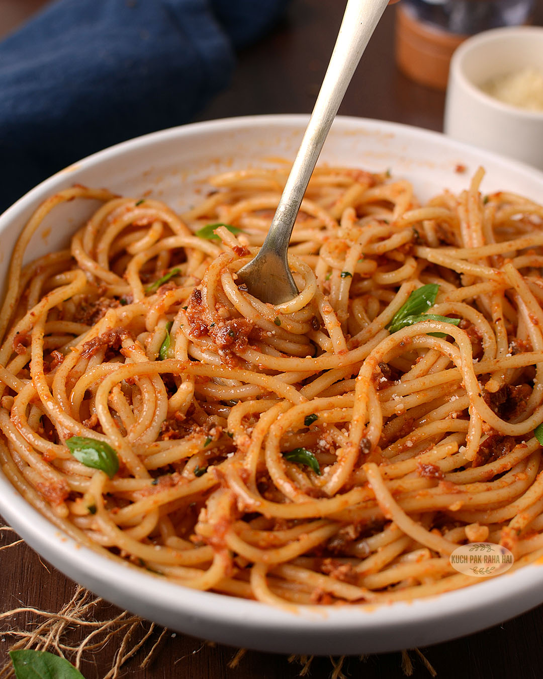 Pesto pasta with sun dried tomatoes.