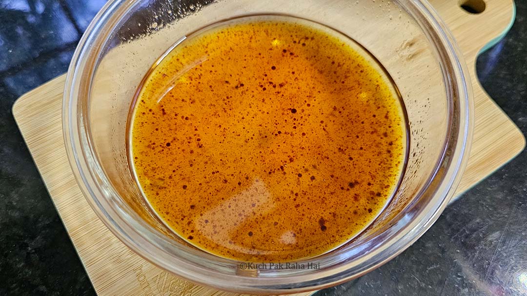 Mixing honey vanilla & oil.