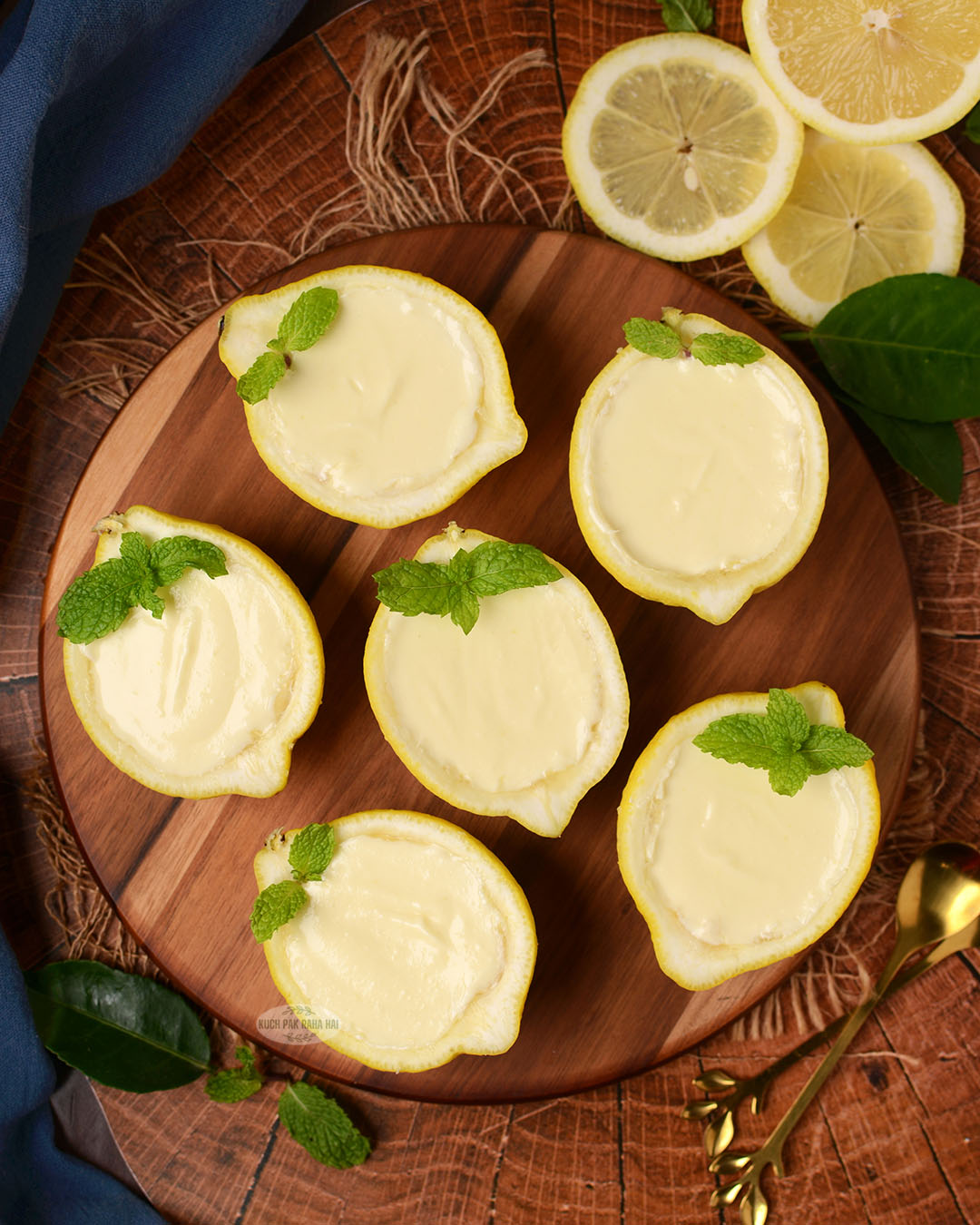 Lemon posset garnished with mint leaves.